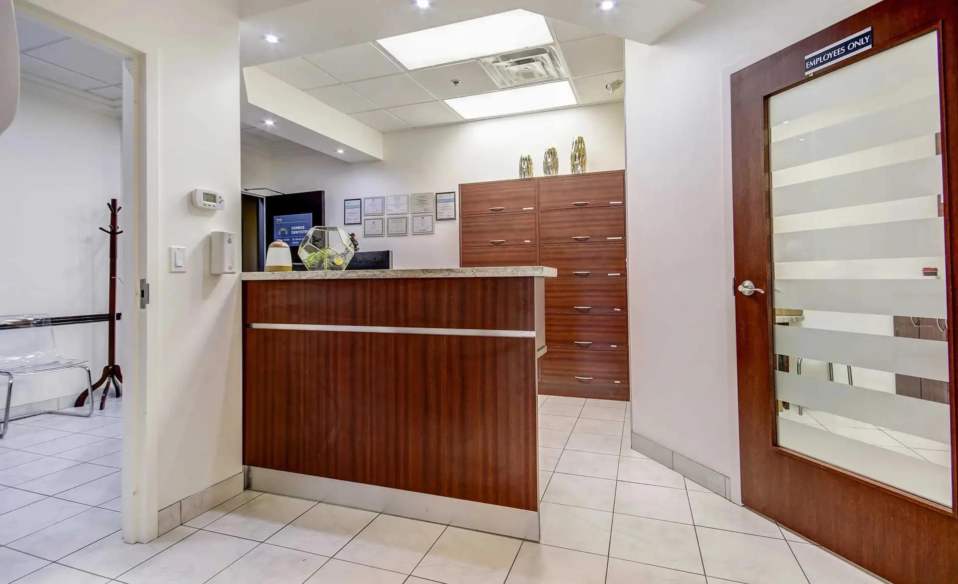 Reception desk at Sunrise Dentistry in Centennial Park Plaza, Etobicoke